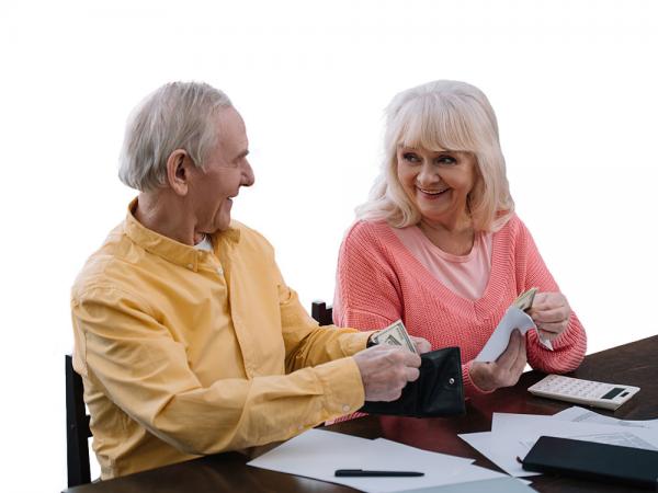 Elderly couple with money