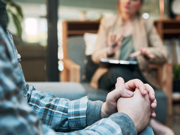 Man sitting in therapy session