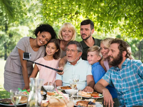 An extended family taking a selfie.