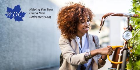 Woman securing her bicycle with a safety lock. Image includes WDC logo with texts, "Helping You Turn Over a New Retirement Leaf."
