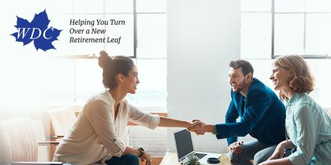 A woman sitting on the left shakes hands with a man sitting on the right with another woman. Accompanying graphic: WDC logo and tagline, "Helping You Turn Over a New Retirement Leaf"