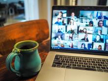 mug on desk with laptop