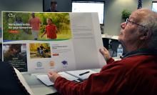Man Viewing Image of New Website